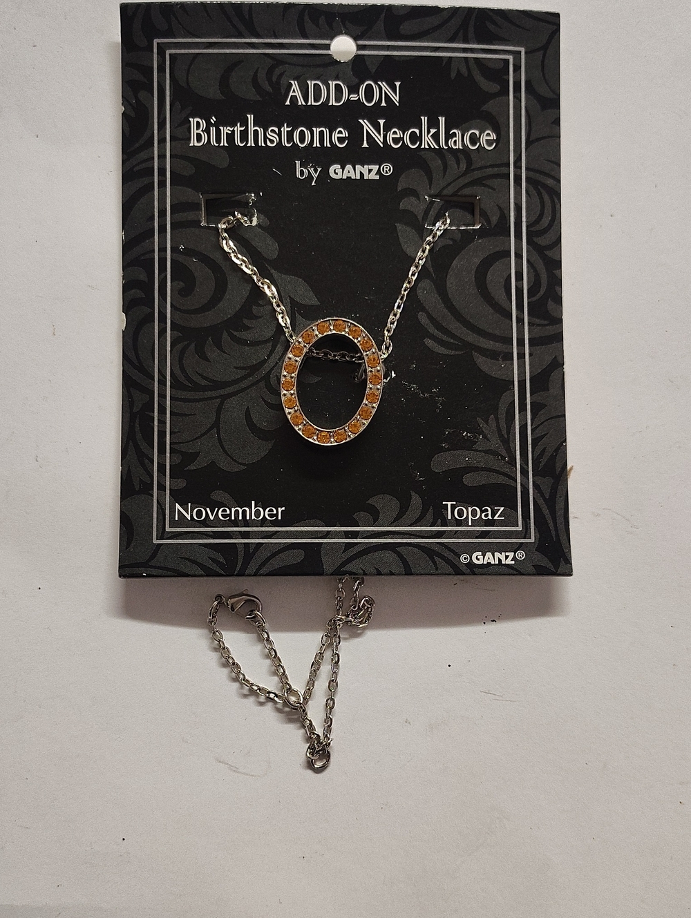 GANZ Silver Necklace with Orange Topaz Circle Pendant